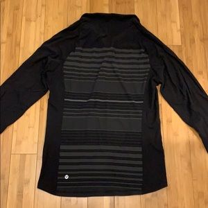 Lululemon men’s half zip- black with design on back